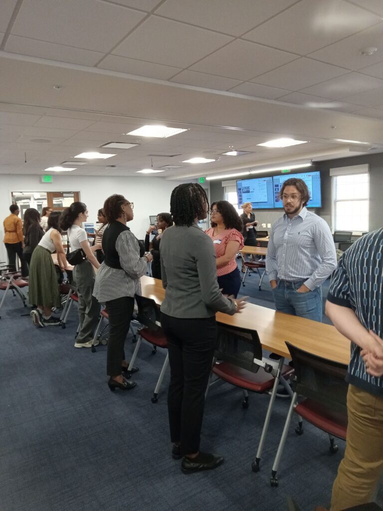 Fellow presenting research at ACE